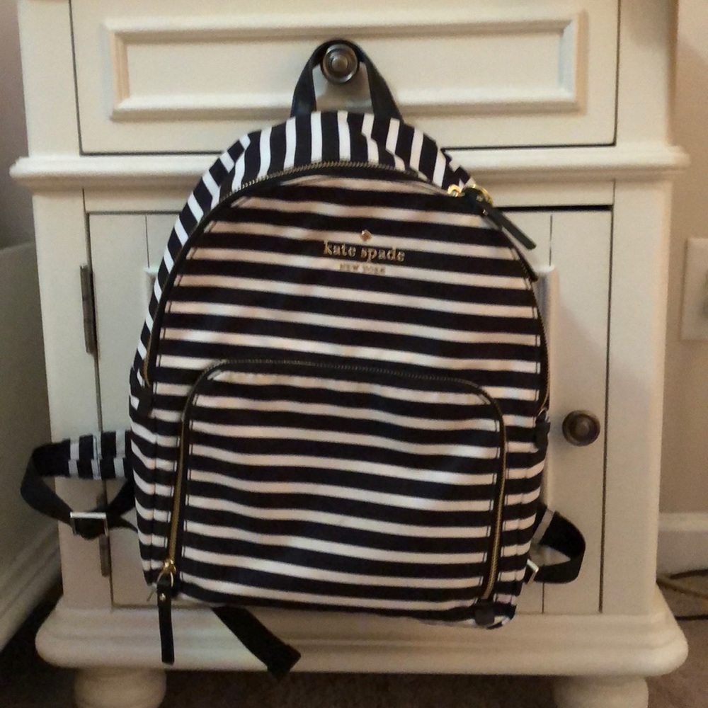 Kate spade black and white striped backpack.